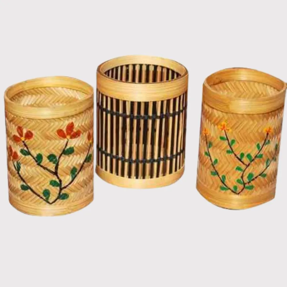 Hand-painted bamboo pen holders with floral vine motifs – artisanal OEM desk accessories by EHM
