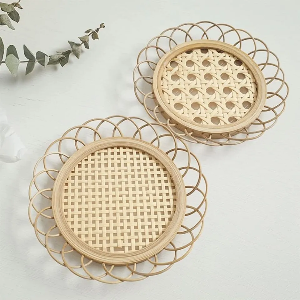 Open-weave rattan coaster with cane webbing pattern.