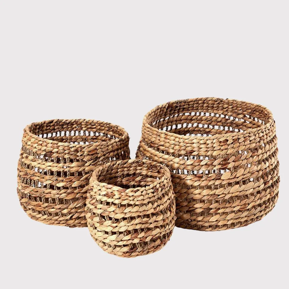 Set of 3 nested water hyacinth decorative baskets with open weave pattern, handcrafted for stylish home storage by Vietnam manufacturer EHM.