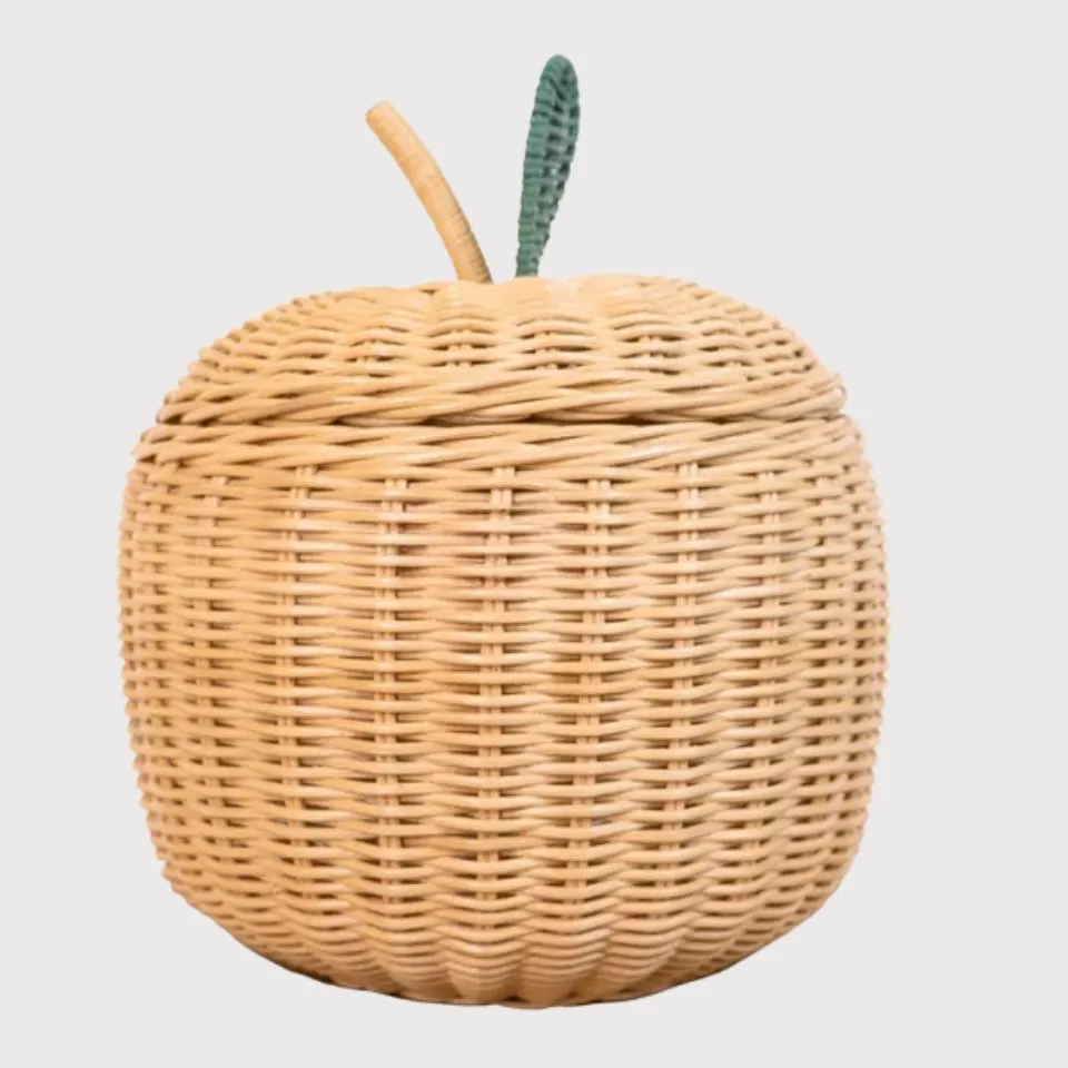 Rattan apple-shaped lidded basket with green leaf stem, whimsical handmade decor by EHM.