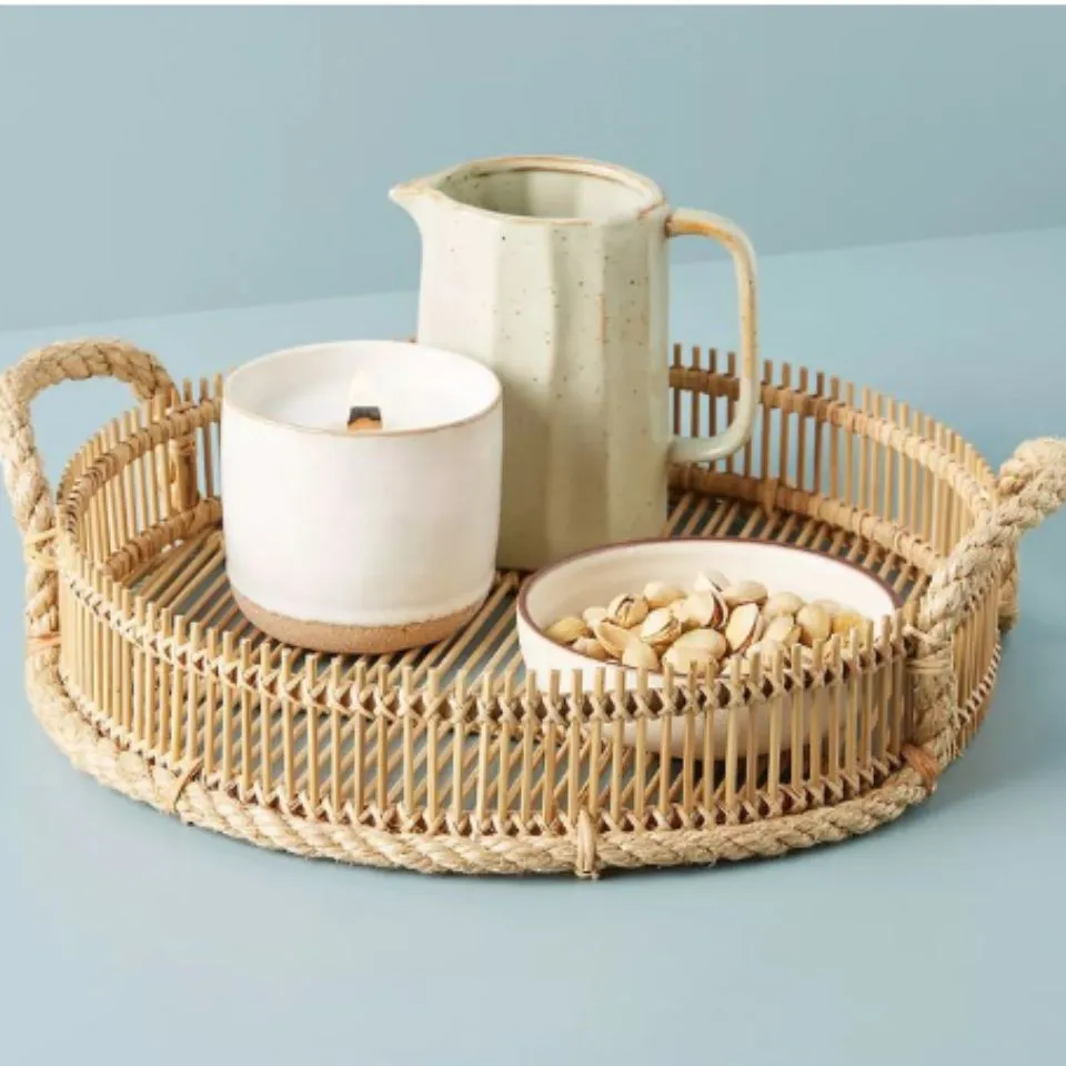 Round woven rattan decorative tray, made in Vietnam by EHM ethical artisans.