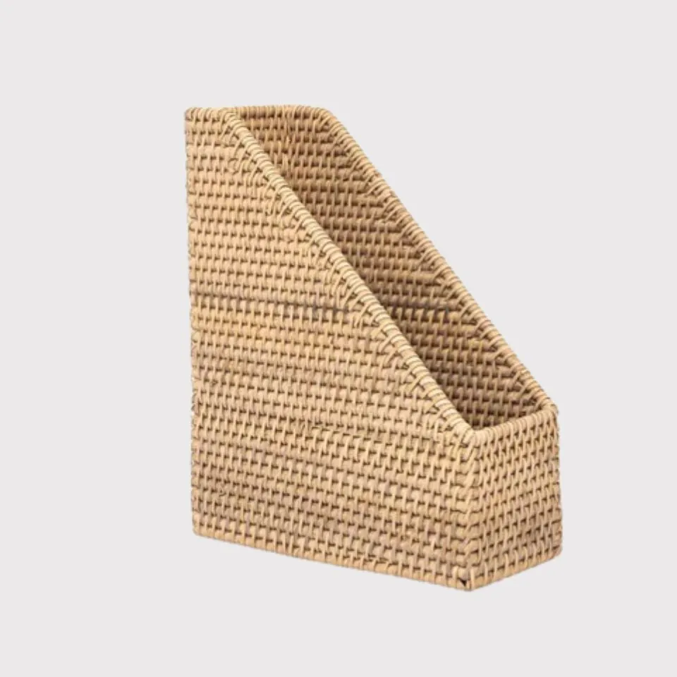 Handwoven rattan desk magazine holder with angled design for easy file access, crafted by EHM for custom desk organizer manufacturing
