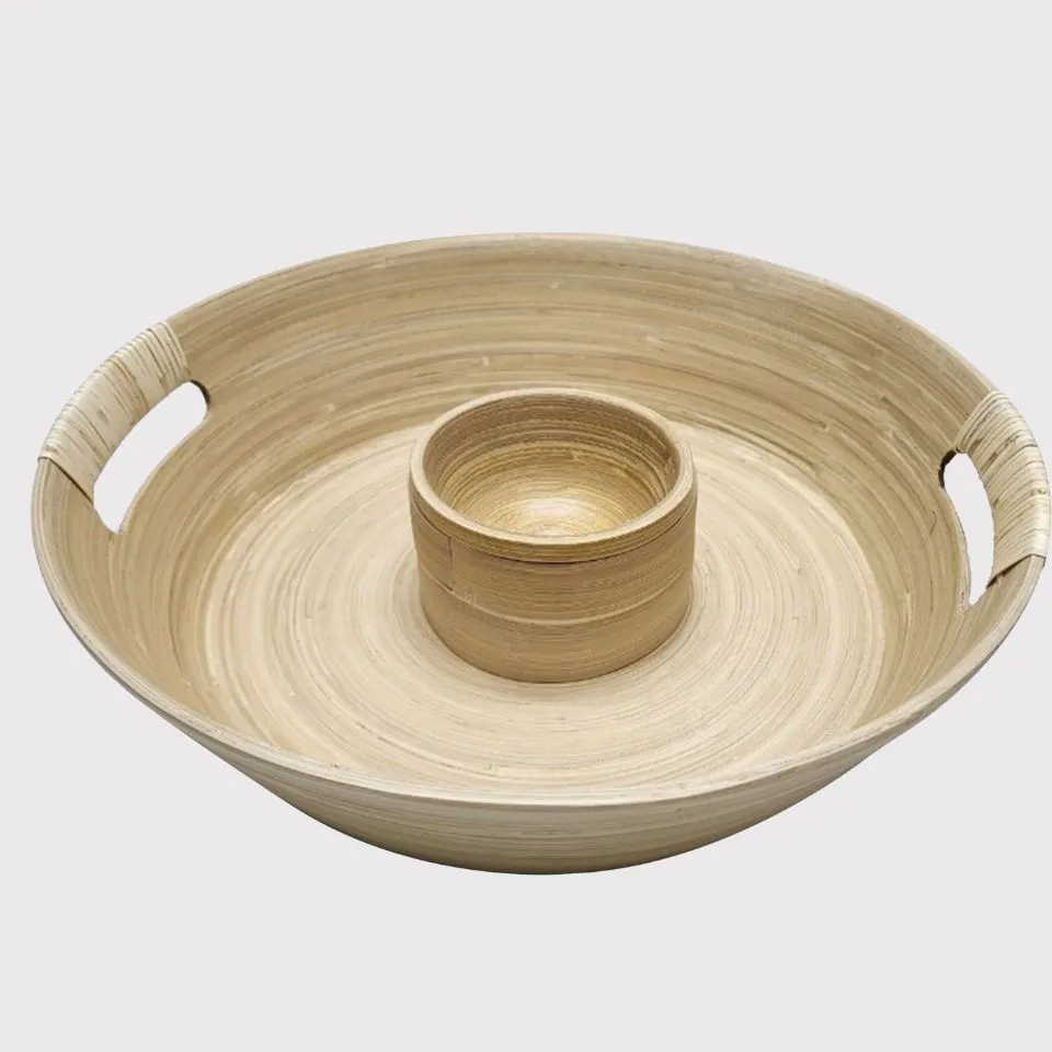 Bamboo dip and chip tray with rattan-wrapped handles and central dip bowl – functional luxury design.