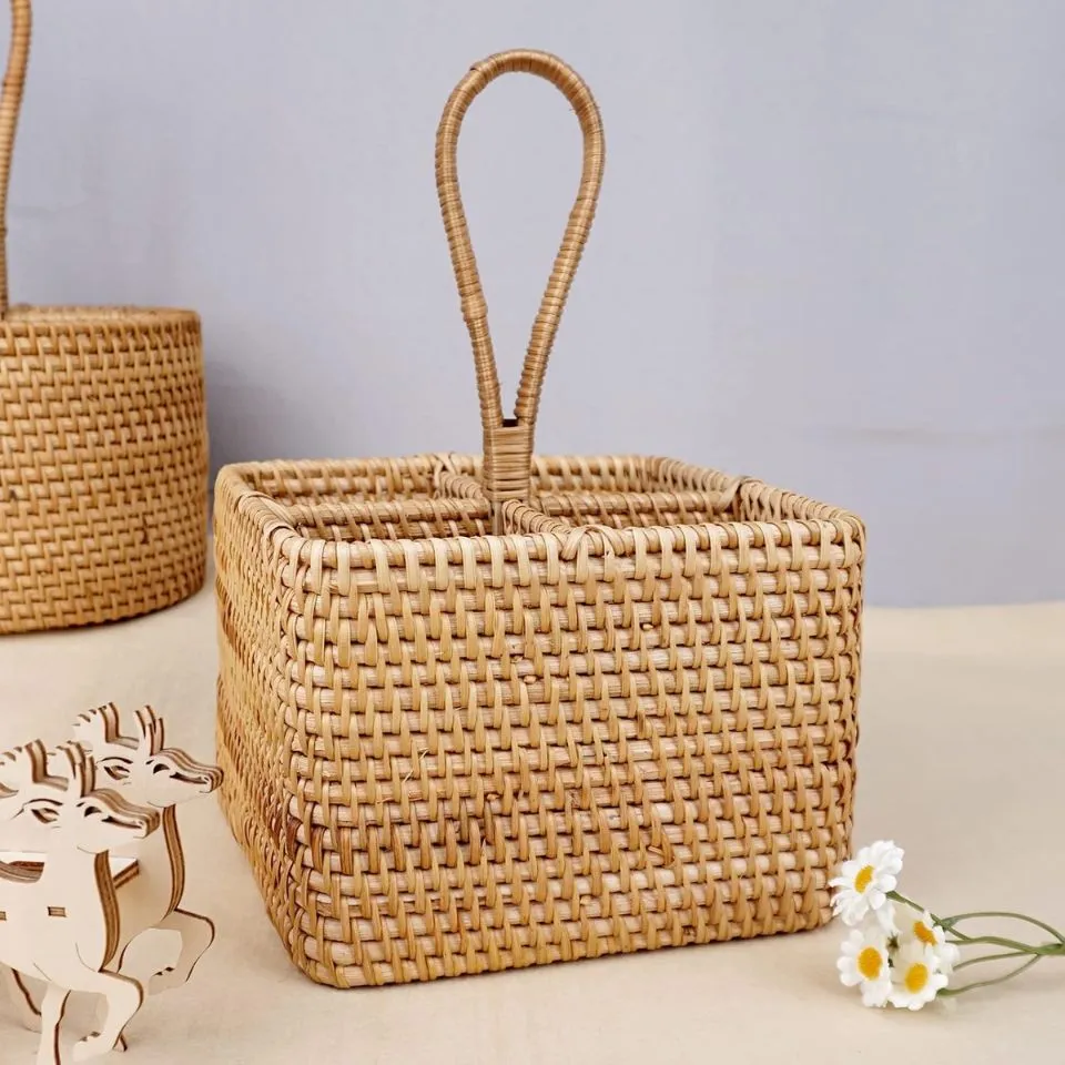 Elegant rattan flatware caddy featuring a woven handle and divided sections, showcasing high-quality custom rattan weaving for professional kitchen storage.