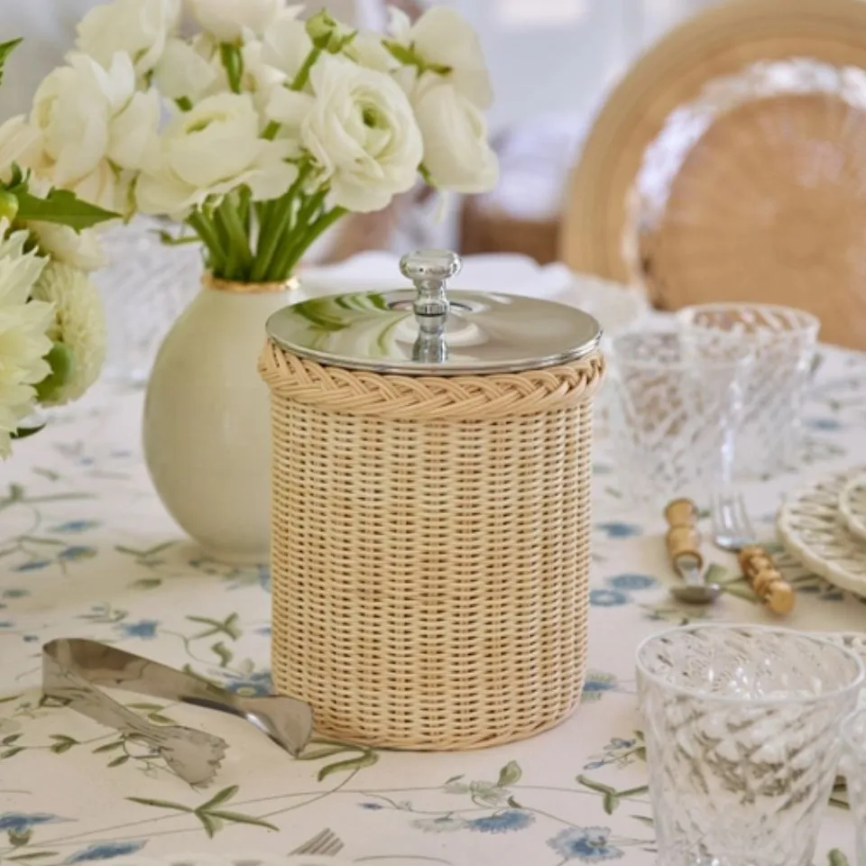 Premium handwoven rattan ice bucket with metal lid and knob – insulated, elegant barware by EHM, ethical kitchenware manufacturer specializing in custom designs.