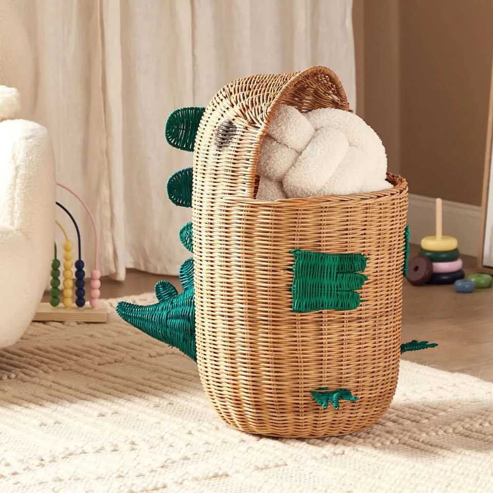 Playful green dinosaur wicker storage basket, handcrafted from rattan for kid basket manufacturers.