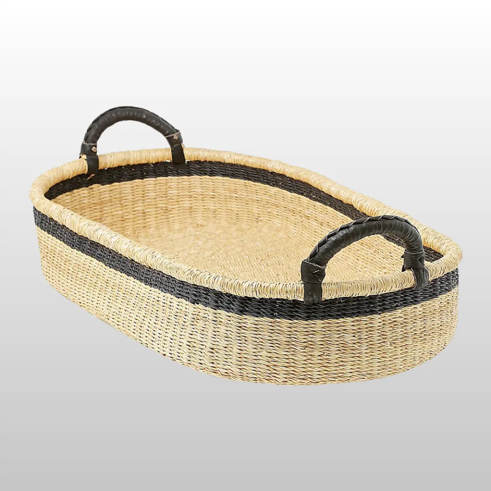 Handwoven natural Seagrass Baby Changing Basket with black border and handles – eco-friendly nursery essential