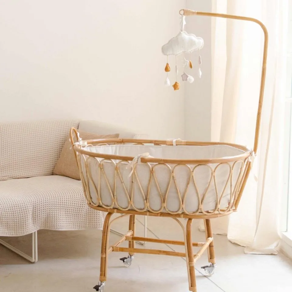 Luxury rattan baby bassinet – eco-friendly, breathable, handcrafted kids furniture from premium rattan.