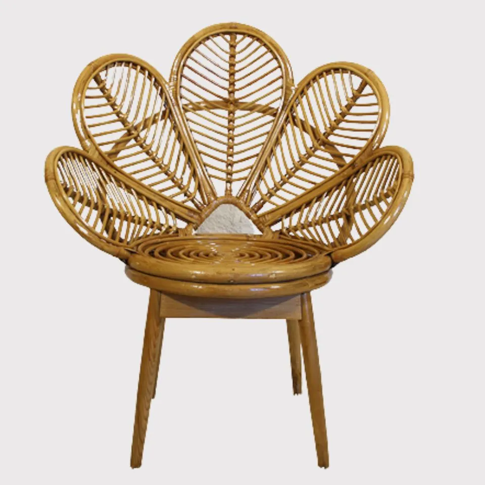 Whimsical rattan flower chair for kids – handwoven from premium natural rattan, perfect for playrooms.