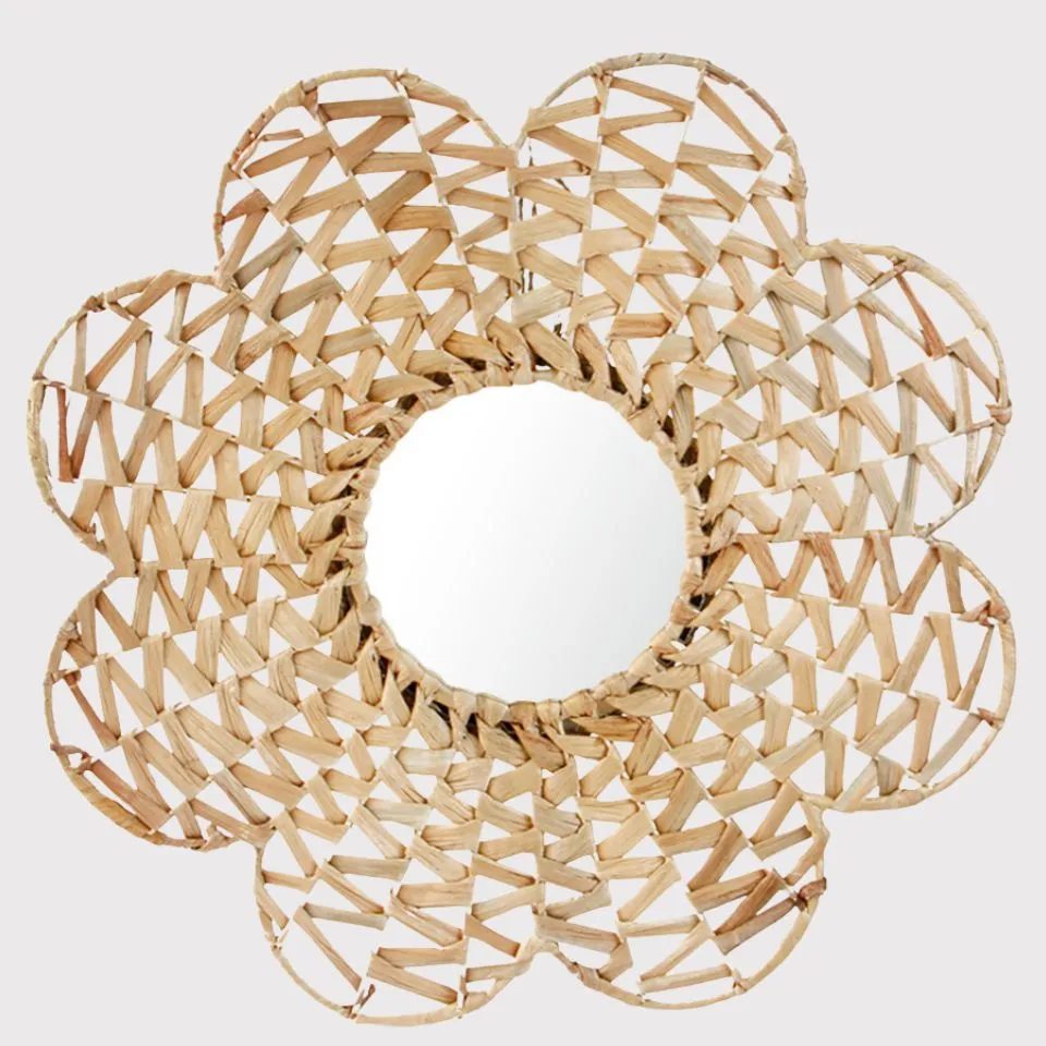 Handwoven water hyacinth flower-shaped wall mirror with intricate petal frame – sustainable handicraft mirror manufacturing by EHM Vietnam.