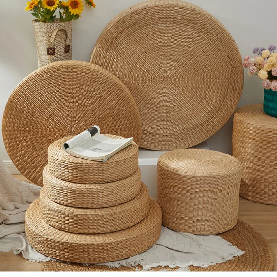 Stackable round water hyacinth floor cushions and cylindrical poufs – eco-friendly handwoven furniture by EHM