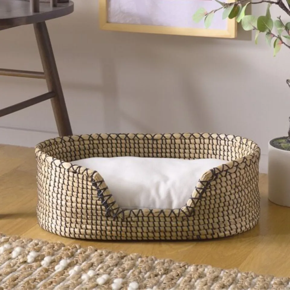 Handcrafted oval seagrass pet bed