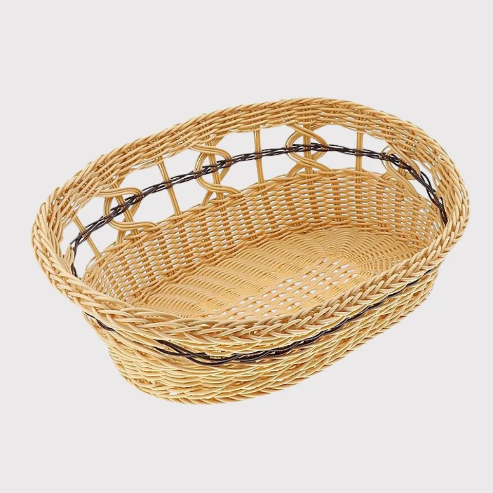 Lightweight handwoven rattan basket with black trim accents, versatile for pet beds or storage in sustainable manufacturing.