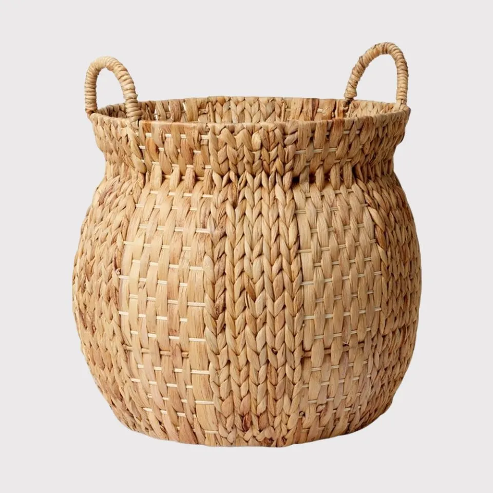 Extra-large handwoven water hyacinth planter basket with integrated handles – natural woven texture – sustainable planters manufacturer
