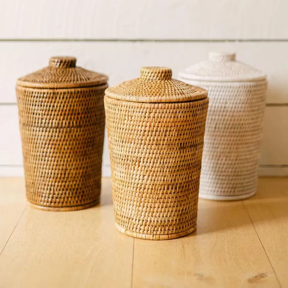 Set of three handcrafted rattan toilet roll holders in natural, whitewash, and brown finishes – EHM bathroom accessories
