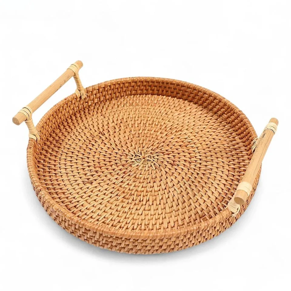 Round woven rattan serving tray with wooden rim and handles, showcasing traditional Vietnamese handicraft by EHM.