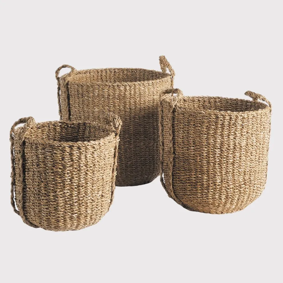 Set of 3 tall seagrass storage baskets with rope-wrapped handles in natural tone