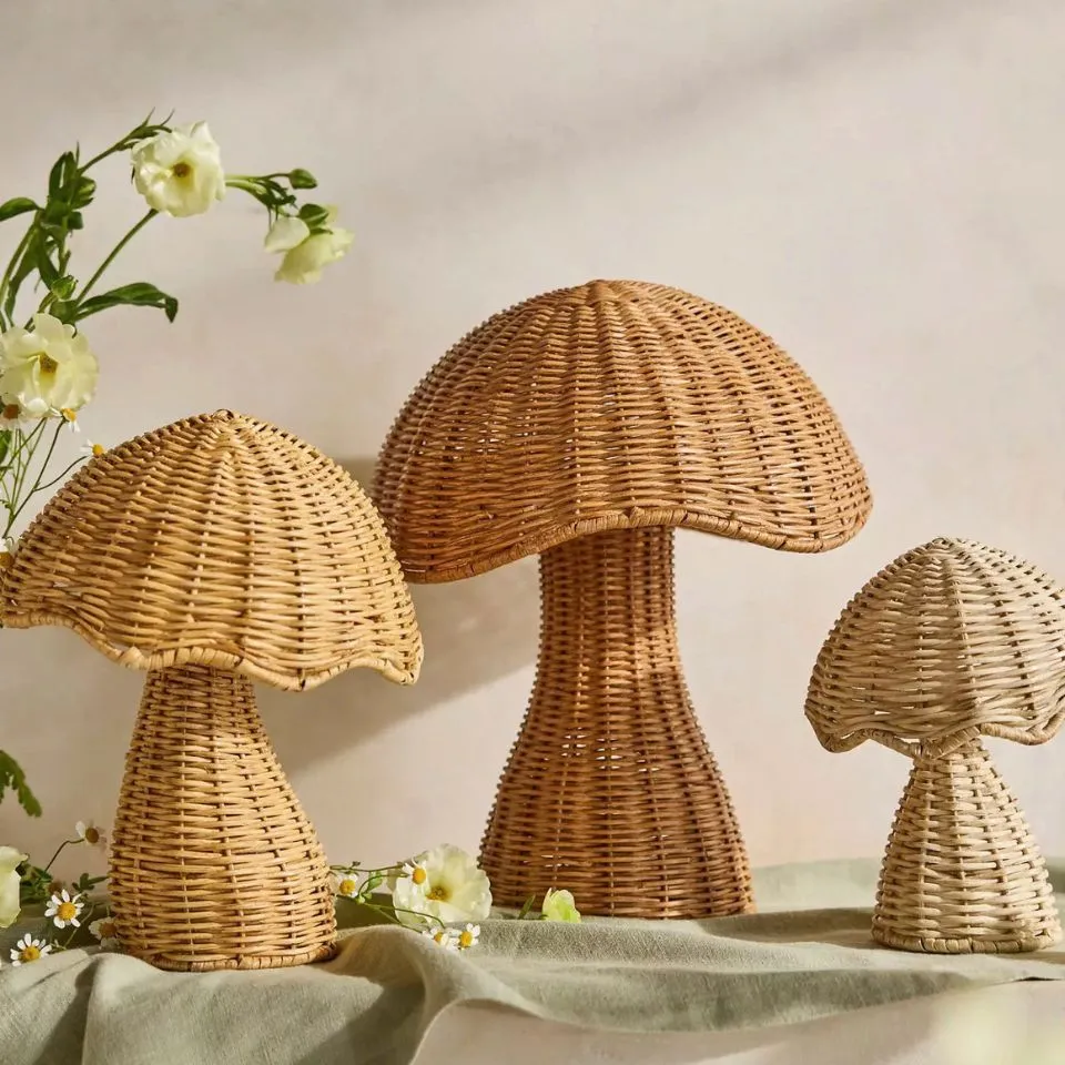 Set of three handwoven rattan mushroom table decorations in varying sizes and natural tones – boho whimsical home decor handmade in Vietnam