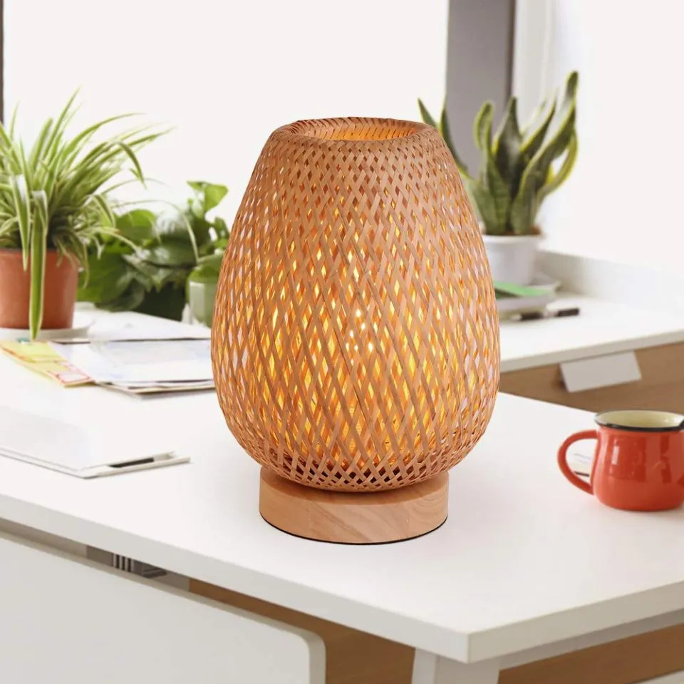 Sleek bamboo table lamp in vase shape – custom manufactured by EHM for luxury home decor brands.