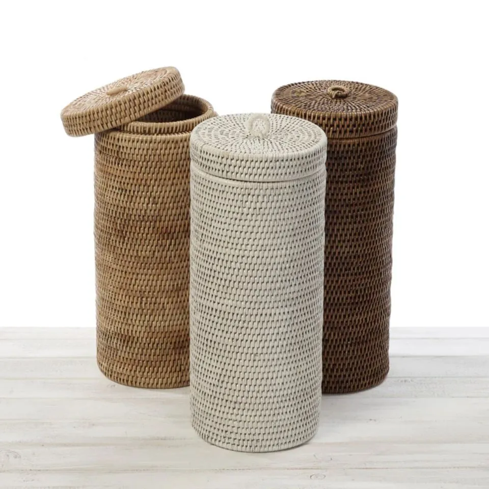 Set of three cylindrical rattan toilet roll holders, finishes with removable lids.