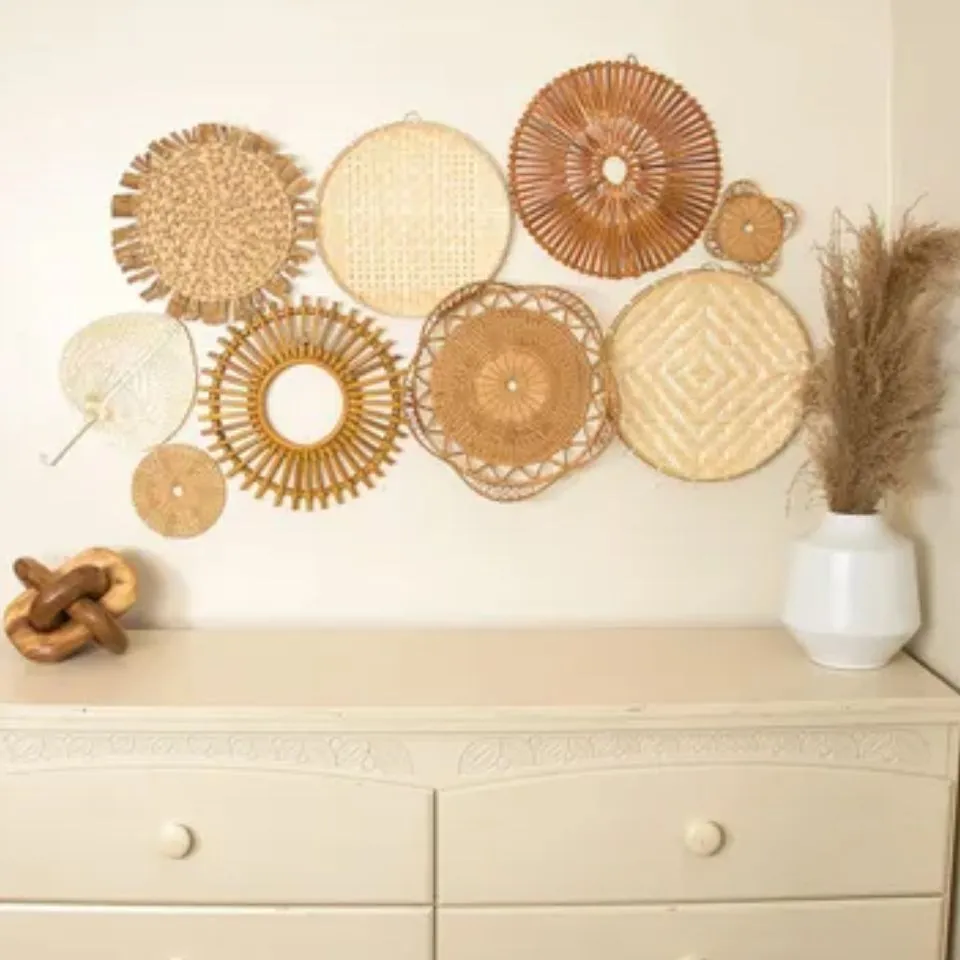 Curated gallery of handwoven rattan and seagrass wall art pieces in mixed textures and geometric patterns, sustainable boho wall decor by EHM.